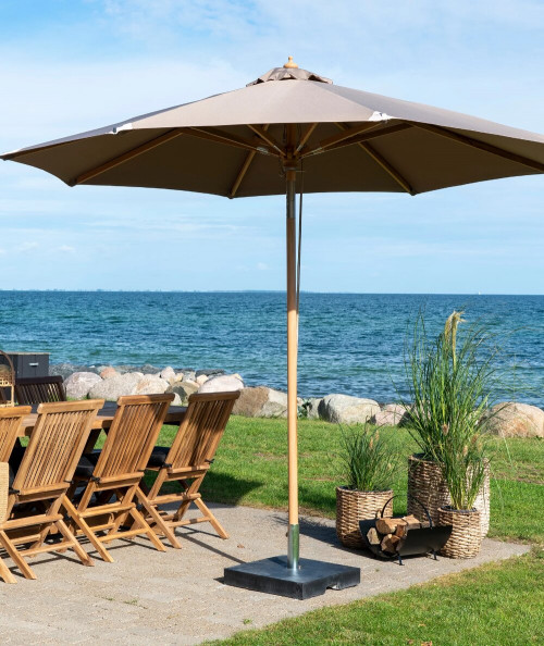 Austin parasol i sand